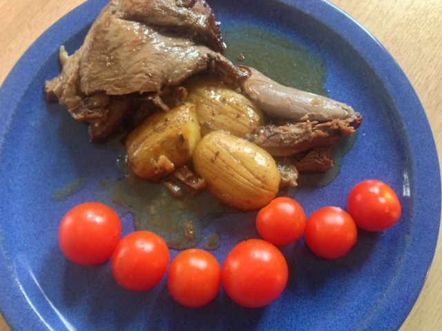 Roast wild boar, potatoes and cocktail tomatoes