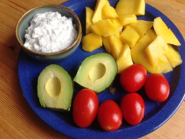 Avocado and fruit plate with macadamia cream