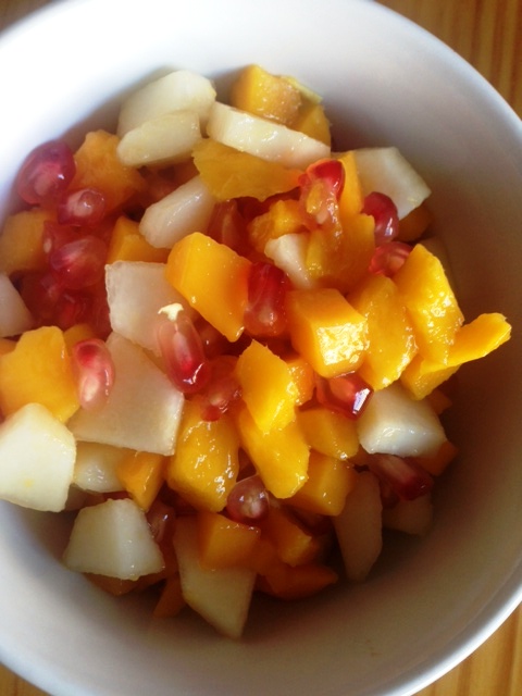 Mango, pear and pomegranate fruit salad