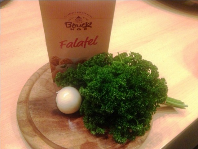 Ingredients for falafel: onion, parsley and falafel mix